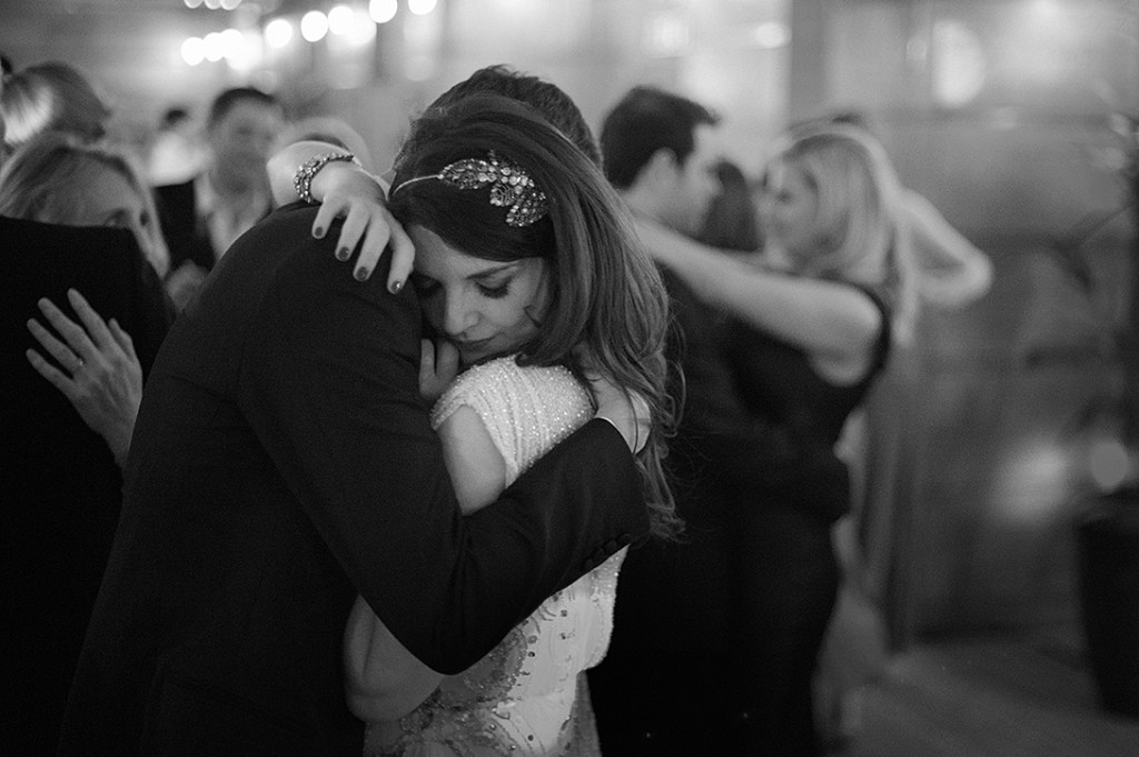couple embrace first dance